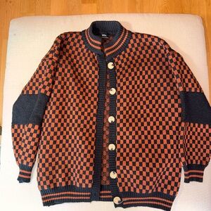 Dressed in LALA Orange/Brown and Black Checkered Bomber Cardigan